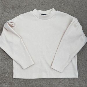 KIRIOUS high neck cream sweater with puff sleeves